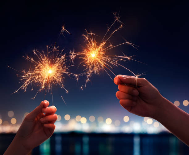 istock Couple holding a burning sparklers 866436398