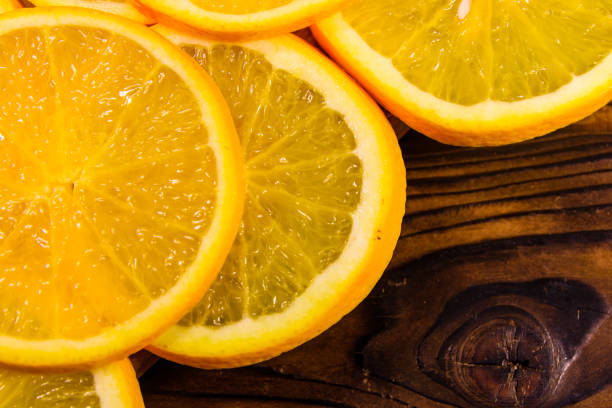 istock Orange fruits on wooden table. Top view 866440938