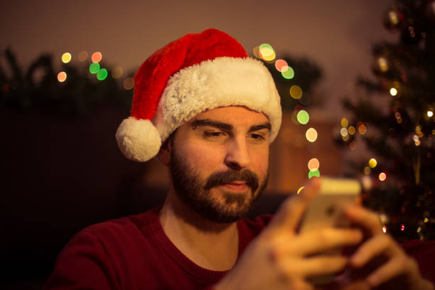 istock Happy man sending text message to his friends 866444074