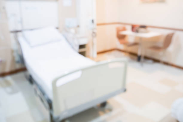 istock Abstract blurred hospital room interior for background 866447396