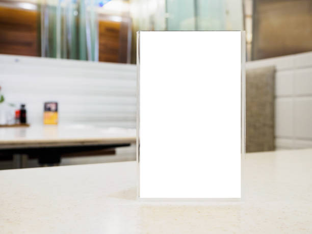 blank menu frame on table in cafe restaurant - poster window display store window imagens e fotografias de stock