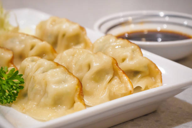 istock Gyoza dumplings with vegetables 866447952