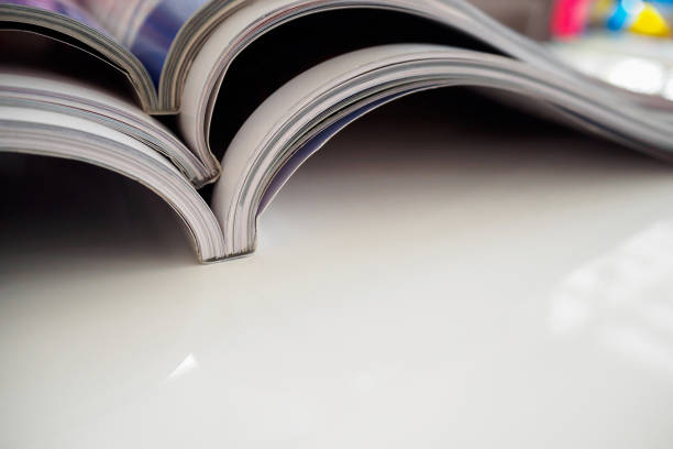 istock pile of magazines stack on white table in living room 866448106