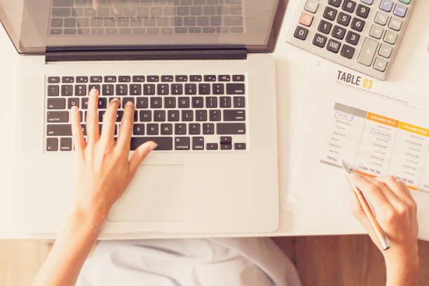 istock Cropped View of Accountant Working on Laptop 866451322