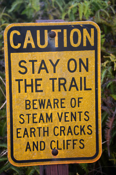 istock Caution sign on trail at Hawaii Volcanoes National Park 866463832