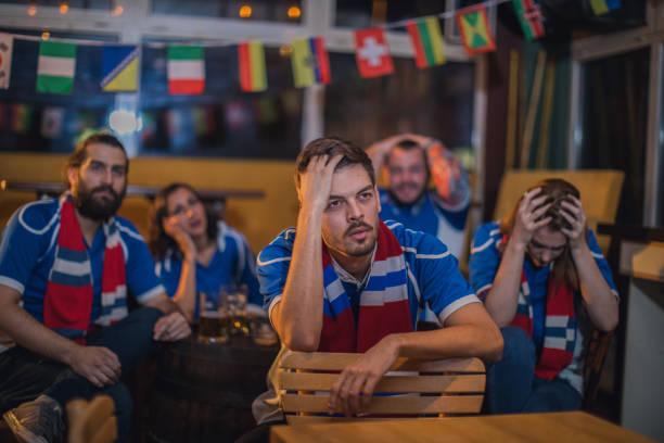 istock Disappointed sport fans 866464652