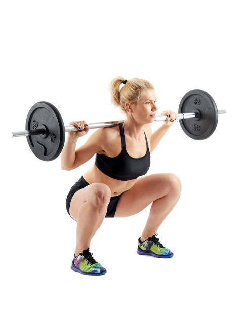 istock Fitness girl doing barbell squats 866468224