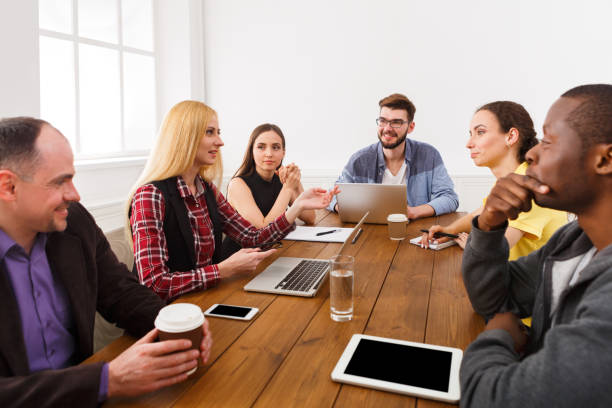 istock Business meeting. Young team in modern office 866471272