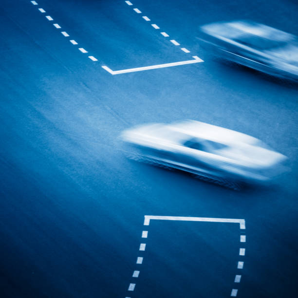 istock high angle view of car on city intersection 866471884