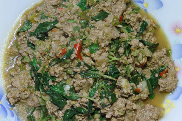 istock Macro image of Stir-fried pork and basil. 866474554