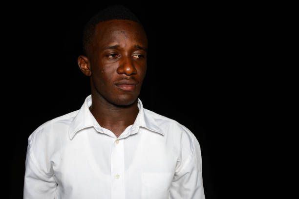 istock Young African businessman outdoors at night 866474562