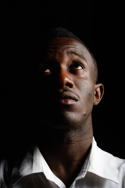 istock Young African businessman outdoors at night 866474644