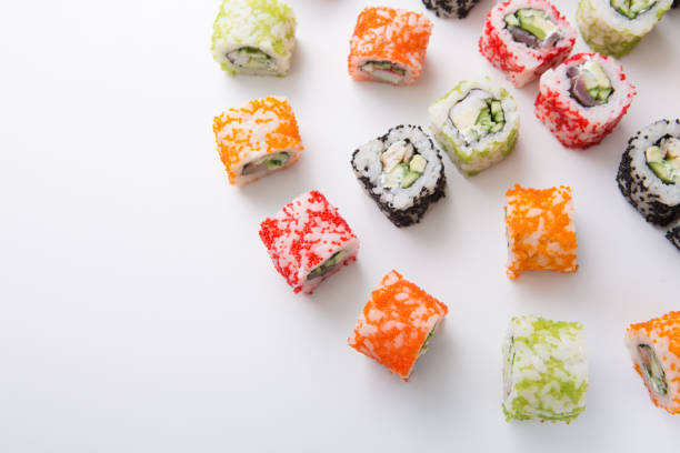 istock Top view on set of sushi rolls,maki on white background copy space 866474742