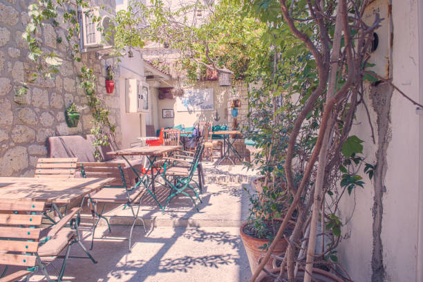 Retro View of Alacati charming Streets , a popular destination Retro Photo Filter Effect-Street view of  Alacati district of Cesme. Alacati  is a popular destination for traveling and vacation in Izmir,Turkey.26 August 2017. Izmir stock pictures, royalty-free photos & images