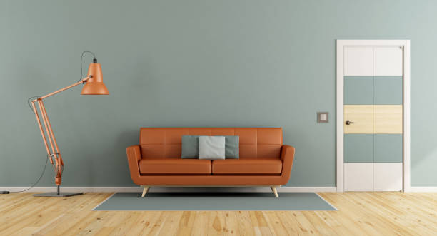 istock Blue living room with orange sofa 866481764