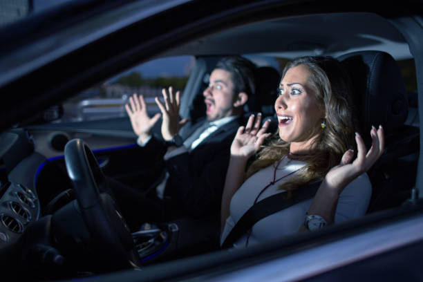 istock Business couple in car almost having an accident 866482732