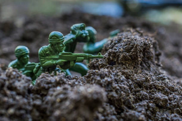 Action figures close-up. Toy soldiers about to attack.