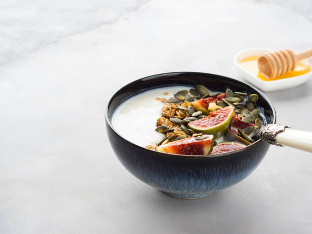 istock Healthy breakfast yogurt bowl with granola and fig 866490580
