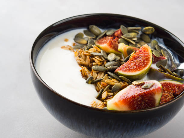 istock Healthy breakfast yogurt bowl with granola and fig 866490728