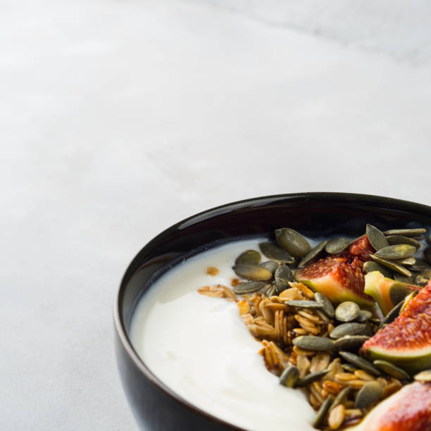 istock Healthy breakfast yogurt bowl with granola and fig 866490810