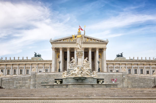 Austrian Parliament Building The Pallas-Athene Fountain in front of the Neoclassical temple of parliament government in Vienna, Austria austrian culture stock pictures, royalty-free photos & images