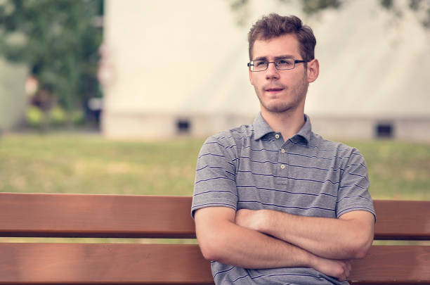 istock Young man relaxing on the bench 866498060