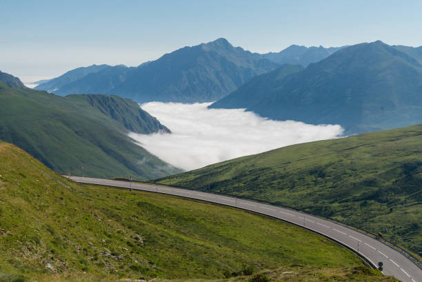 istock Road leading through Pyrenees Mountains, France. 866501534
