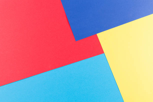 istock Color papers geometry flat composition background with yellow, red and blue tones 866502486