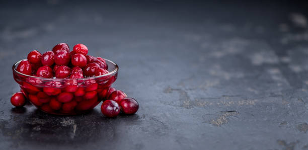istock Fresh made Cranberries (preserved) on a slate slab (close-up shot; selective focus) 866503560