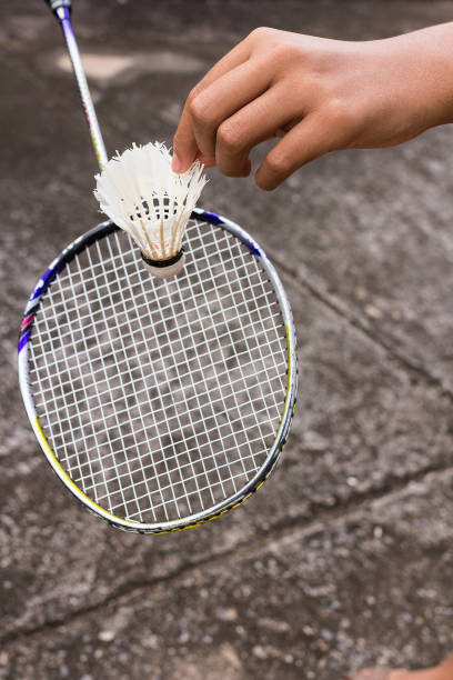istock Hand of badminton player with racket 866506464