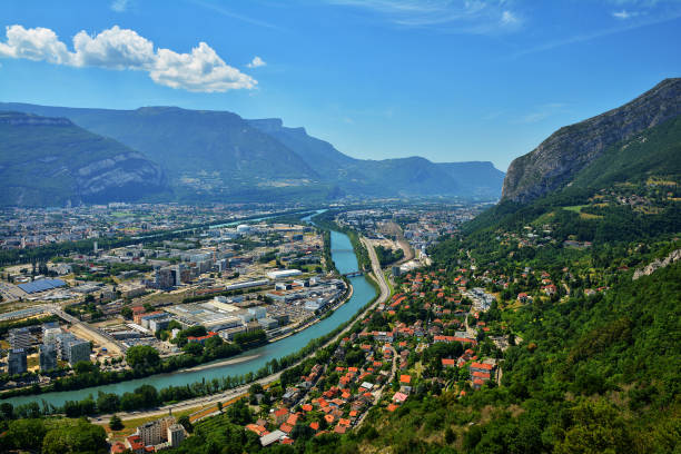 Amazing view with bridge over Isere river in Grenoble Amazing view with bridge over Isere river .View from above, from Fort Bastille in Grenoble, France isere river stock pictures, royalty-free photos & images