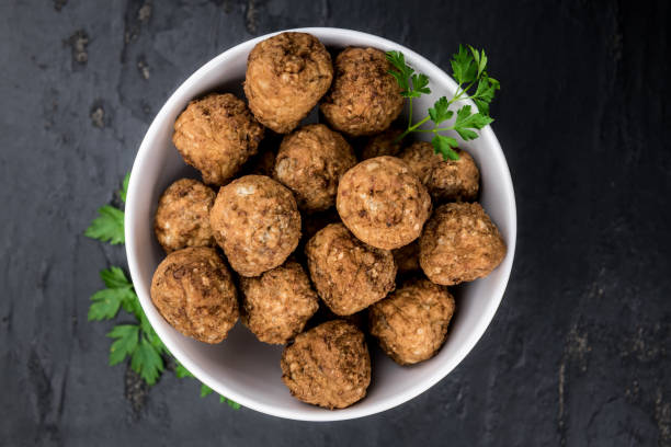 istock Meatballs (fresh made) as detailed close-up shot, selective focus) 866512700