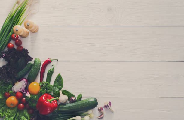 istock Fresh vegetables border on white wood background with copy space 866512904
