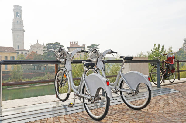 istock Bicycles on the background of the cityscape. 866521380