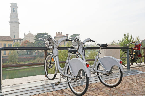 istock Bicycles on the background of the cityscape. 866521402