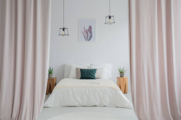 istock Pink curtains in bright bedroom 866523750