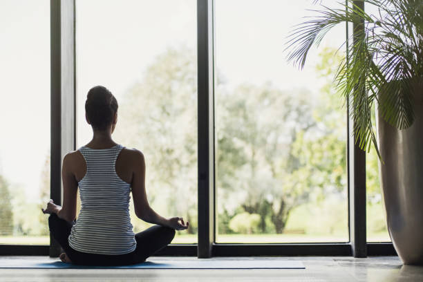 istock Young woman practicing yoga. Meditation and harmony concept 866524108