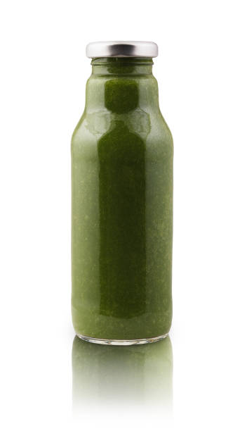 istock Avocado and spinach smoothie juice bottle isolated on white background 866529896