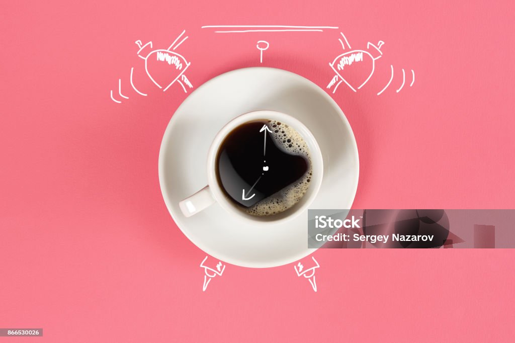 Clock. Cup of fresh espresso with clock sign on pink background Clock. Cup of fresh espresso with clock sign on pink background. Still life. Mock up. Flat lay. Copy space Monday Stock Photo