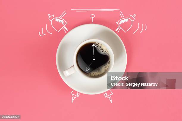 Clock Cup Of Fresh Espresso With Clock Sign On Pink Background Stock Photo - Download Image Now