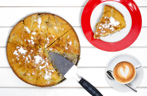 istock Cake pie with apples cup of coffee 866533834