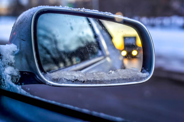istock View in the side mirror of the car 866539884