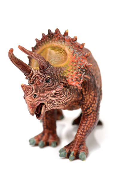 istock Dinosaur toys on white background 866544234