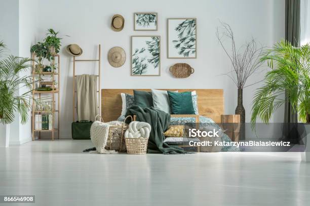 Wall With Hats And Posters Stock Photo - Download Image Now - Home Decor, Building Story, Basket