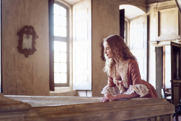istock 18th century woman in a castle 866556130