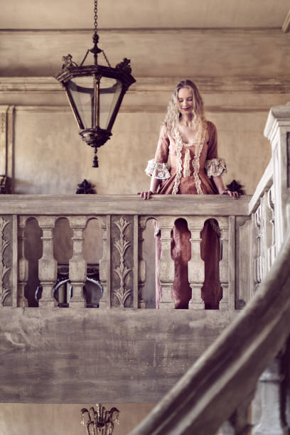 istock 18th century woman in a castle 866556304