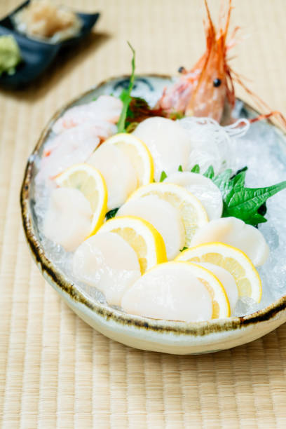 istock Raw and fresh sashimi set with hotate oyster and prawn or shrimp 866556648