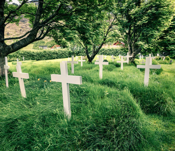 Gravestones in an urban cemetery in the early spring season.