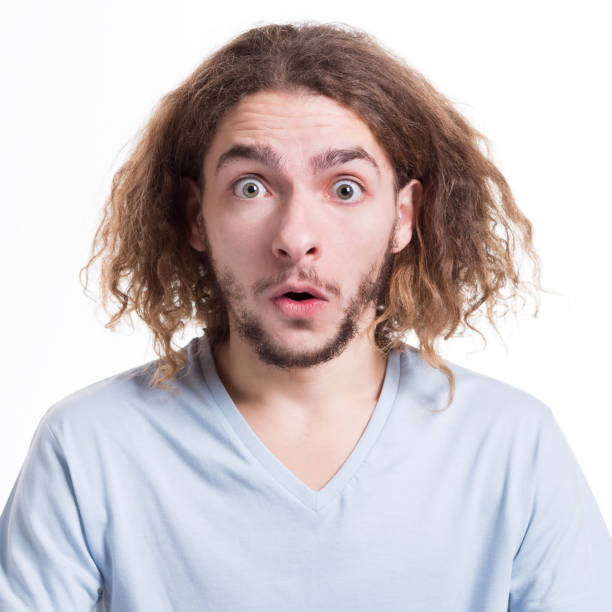 istock Surprised man expressing amaze on face 866562300