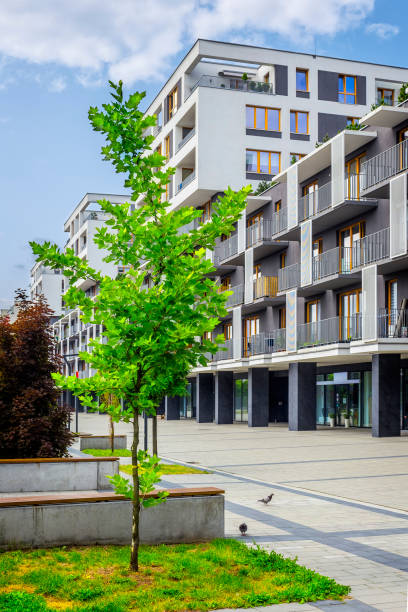istock Green square in front of apartment building 866562528